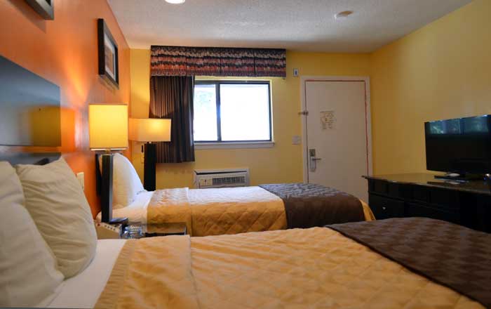 Free Parking Bus Truck Enfield Inn and Suites Hotels Motels byBradley International Airport Clean Comfortable Room Cable Channels Flat Screen TV