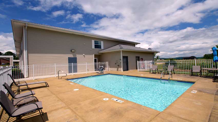 Seasonal Outdoor Pool Budget Affordable Lodging Motels Hotels Clean Comfortable Flat Screen TVs