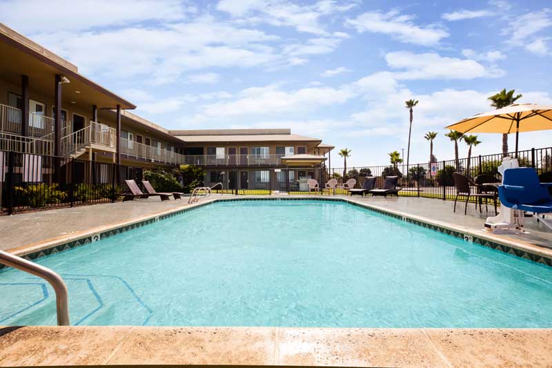Clean Comfortable Accommodations lodging Hotels Mid Towne Inn and Suites San Antonio Texas * Clean Comfortable Hotels Motels Pet Friendly Rooms Designated Coffee Parking San Antonio Texas